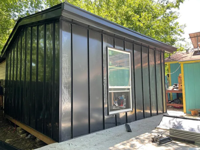 Black standing seam metal wall panels for Roof Inspection in Southwick