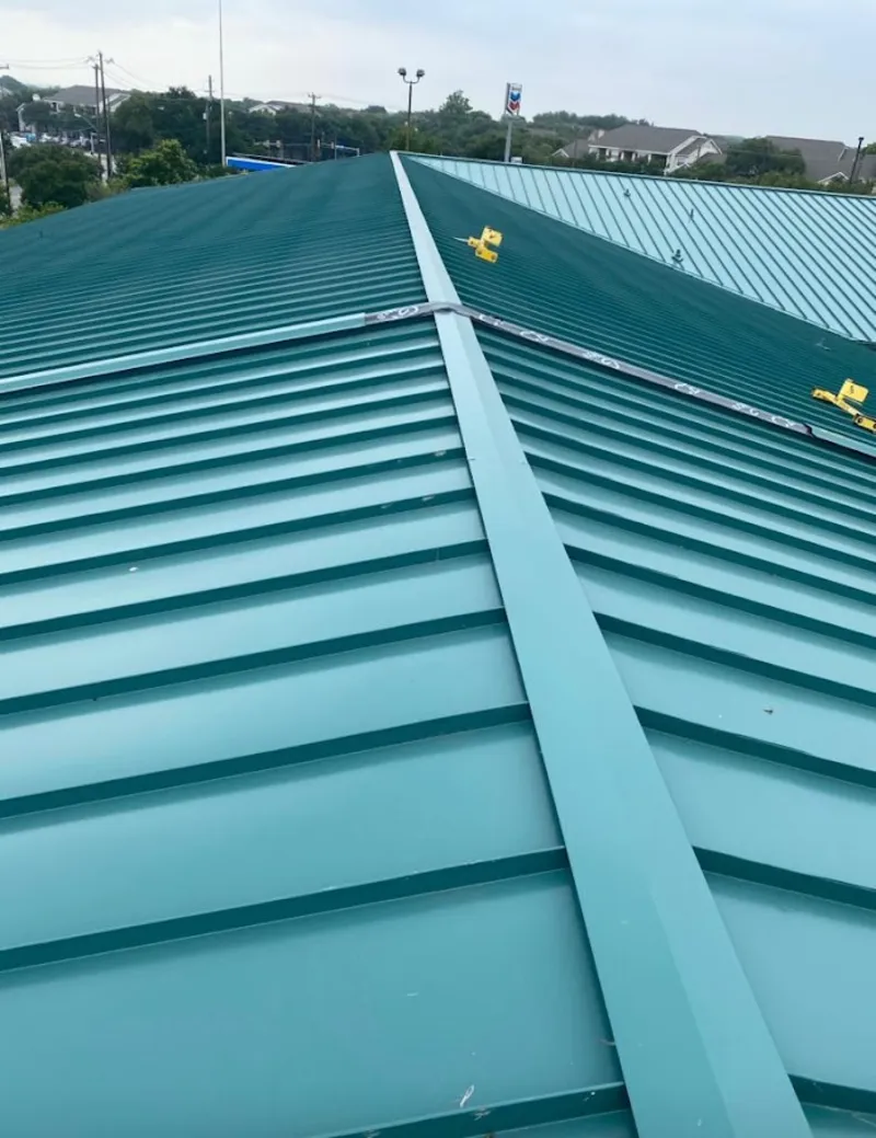 Green commercial metal roof ridge and valley for Metal Roof Repair in Southwick