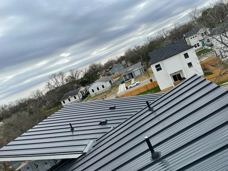 Standing seam metal roof panels with vents for Skylight Repair in Southwick